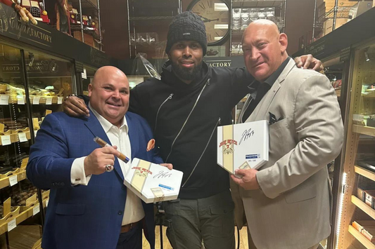 Jose Reyes celebrates his new cigars at the Little Cigar Factory